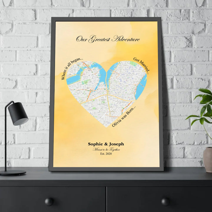 Personalized heart map print showing three meaningful locations with custom title, labels, names, and date - framed poster on table-ARTFULANE