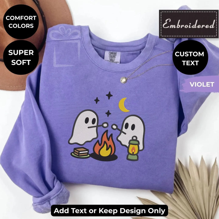 Camping Ghost Sweatshirt in VIOLET – Comfort Colors embroidered crewneck with marshmallow-roasting ghost design, customizable text option-ARTFULANE