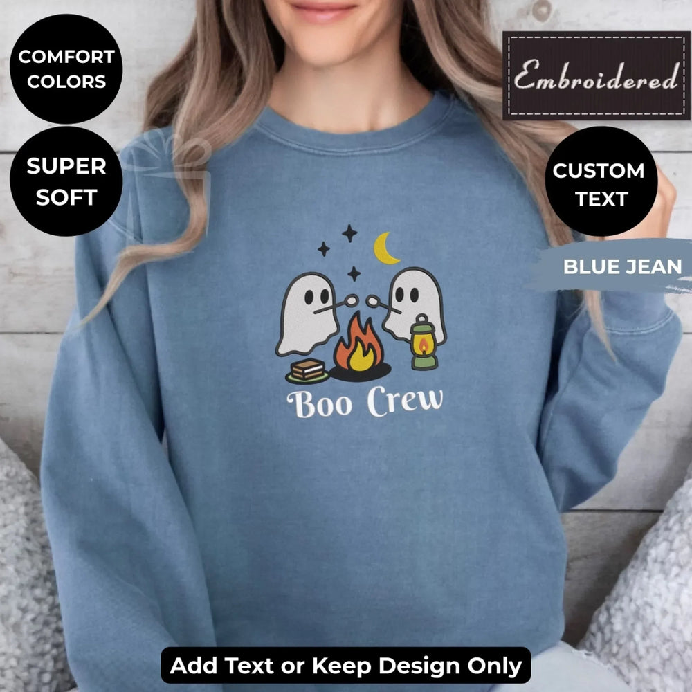 Camping Ghost Sweatshirt in BLUE JEAN – Comfort Colors embroidered crewneck with marshmallow-roasting ghost design, customizable text option-ARTFULANE
