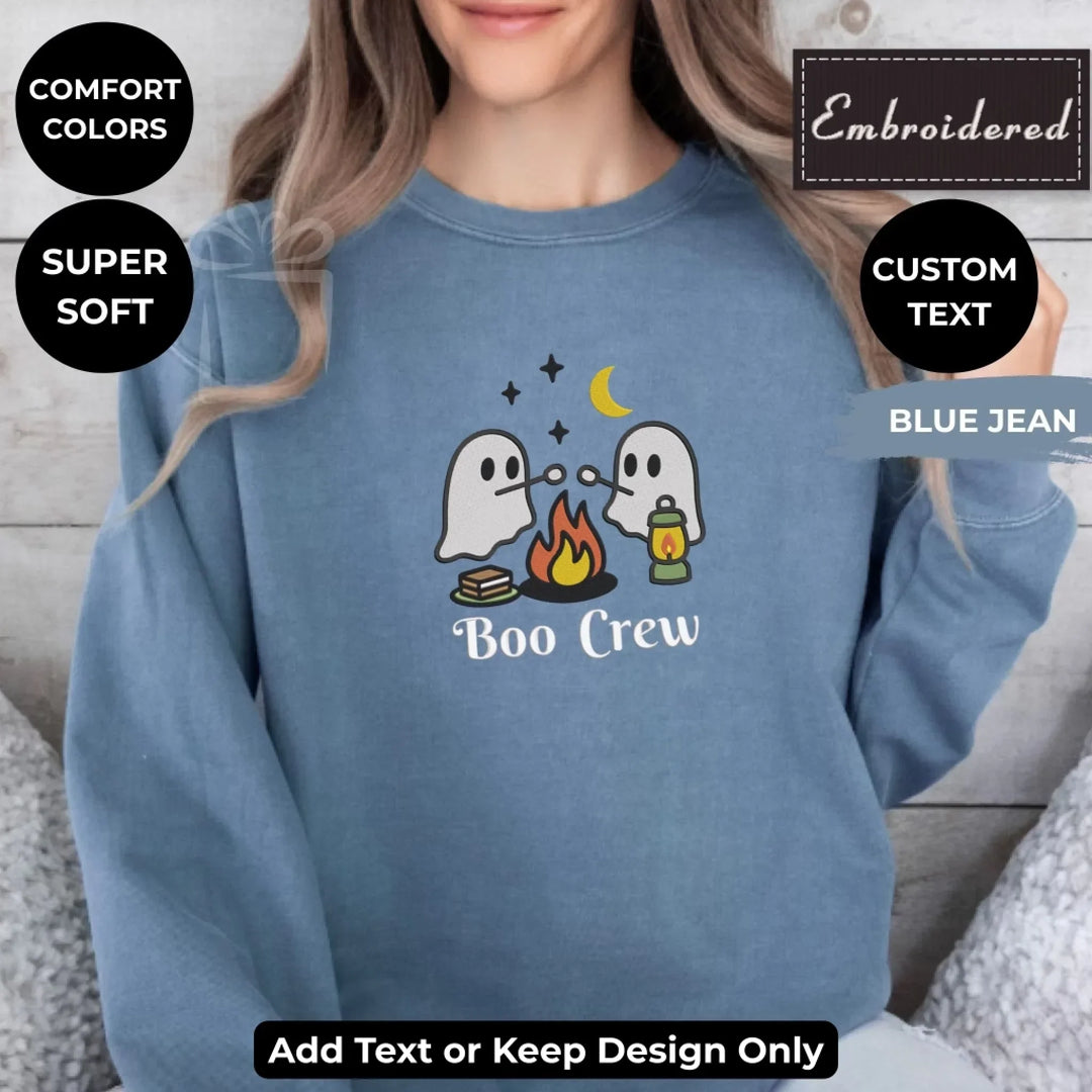 Camping Ghost Sweatshirt in BLUE JEAN – Comfort Colors embroidered crewneck with marshmallow-roasting ghost design, customizable text option-ARTFULANE