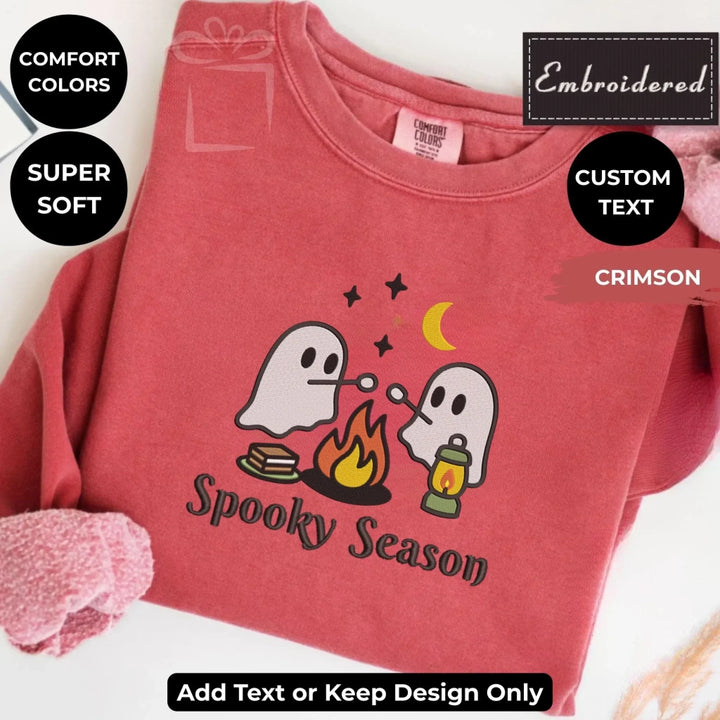 Camping Ghost Sweatshirt in CRIMSON – Comfort Colors embroidered crewneck with marshmallow-roasting ghost design, customizable text option-ARTFULANE