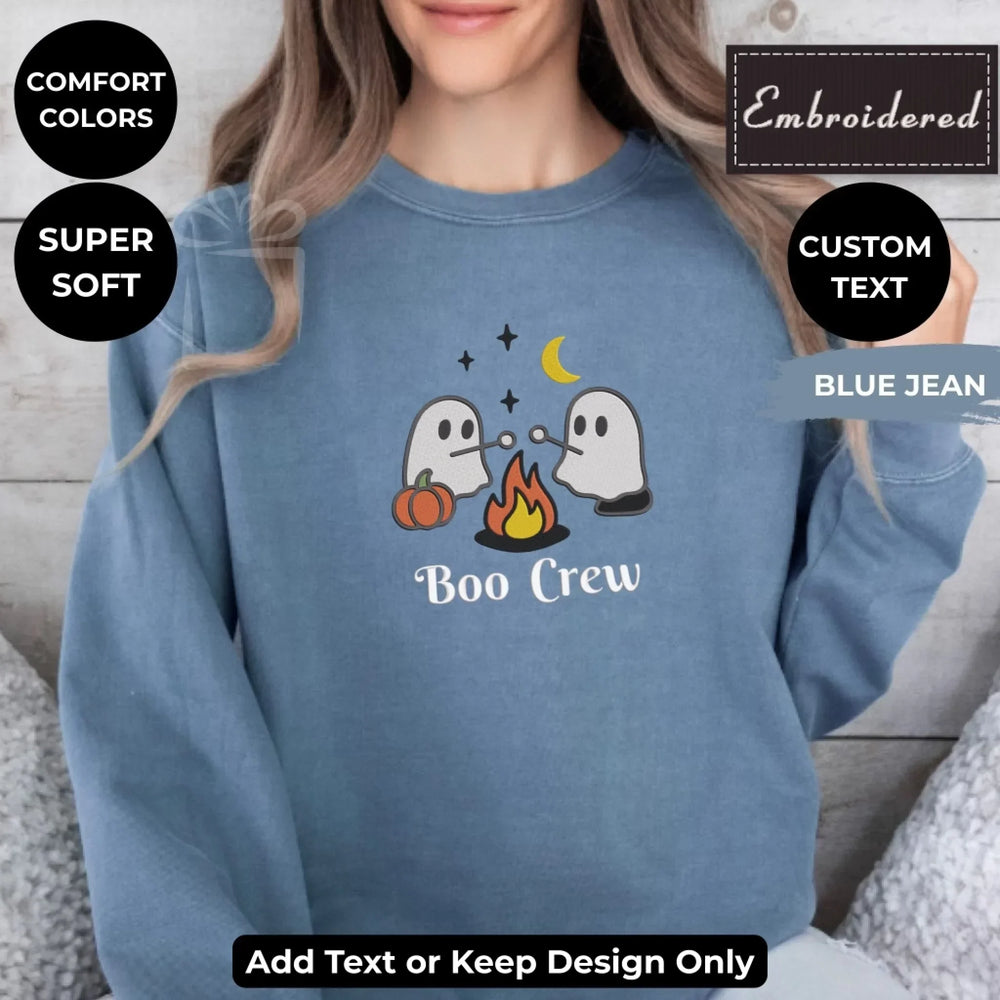 Camping Ghost Sweatshirt in JEAN BLUE – Comfort Colors embroidered crewneck with marshmallow-roasting ghost design, customizable text option-ARTFULANE