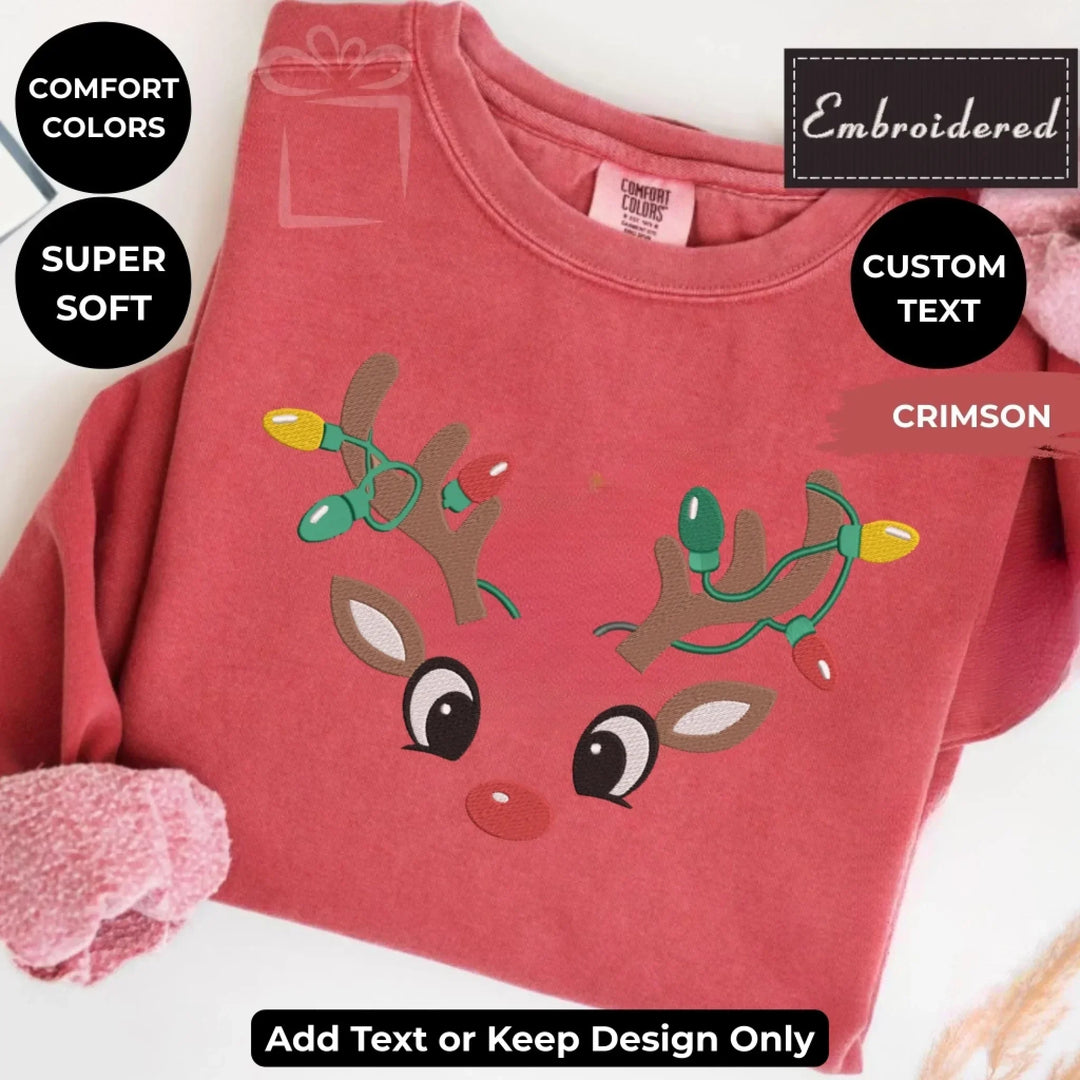 Custom embroidered Christmas Reindeer Sweatshirt in CRIMSON Comfort Colors, unisex style with personalized text option-ARTFULANE