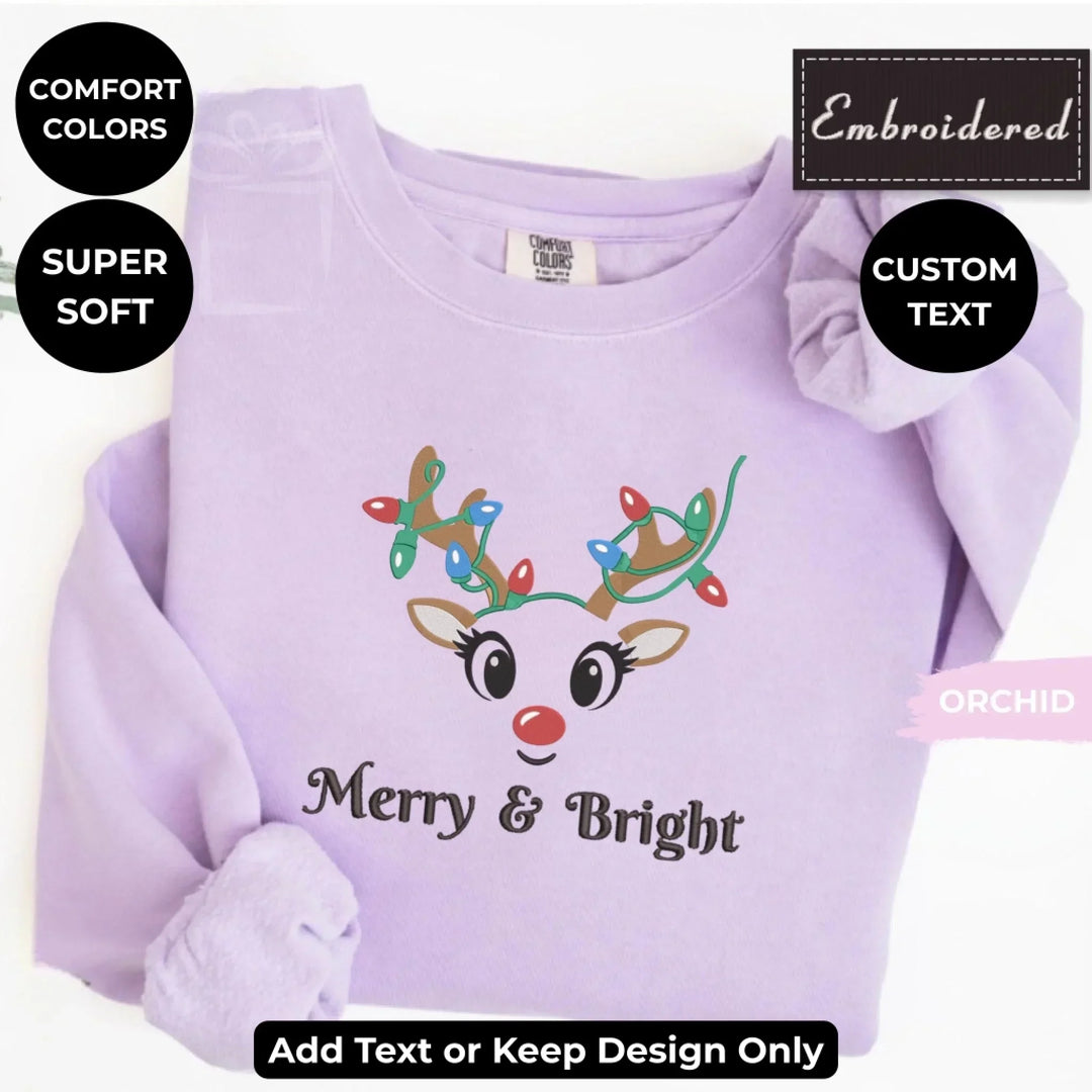 Custom embroidered Christmas Reindeer Sweatshirt in ORCHID Comfort Colors, unisex style with personalized text option-ARTFULANE