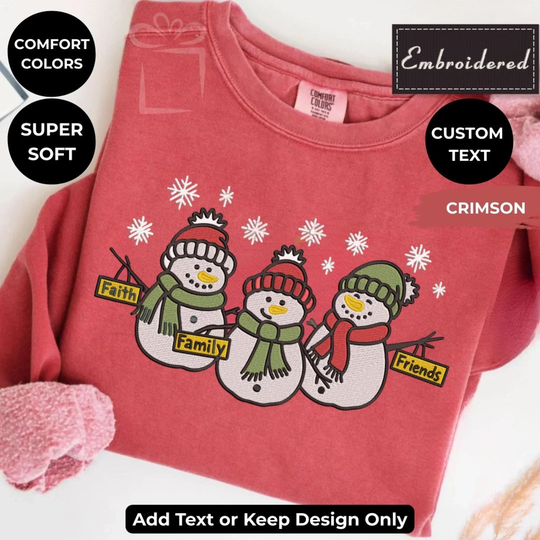 Comfort Colors sweatshirt featuring trio snowmen Faith Family Friends embroidered design – customizable holiday crewneck-ARTFULANE
