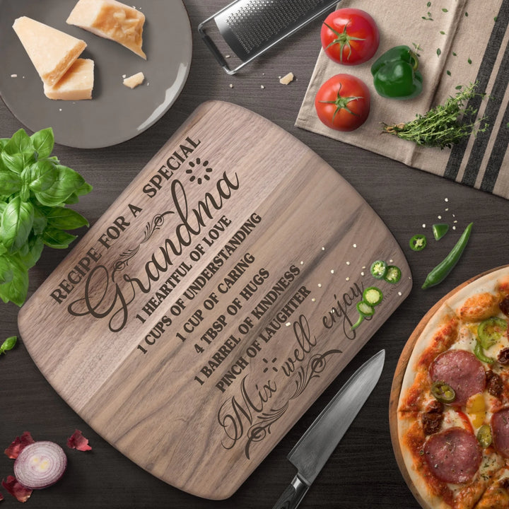 Walnut Hardwood Oval Cutting Board In Use - Engraved wooden cutting boards, featuring custom family recipes by ARTFULANE