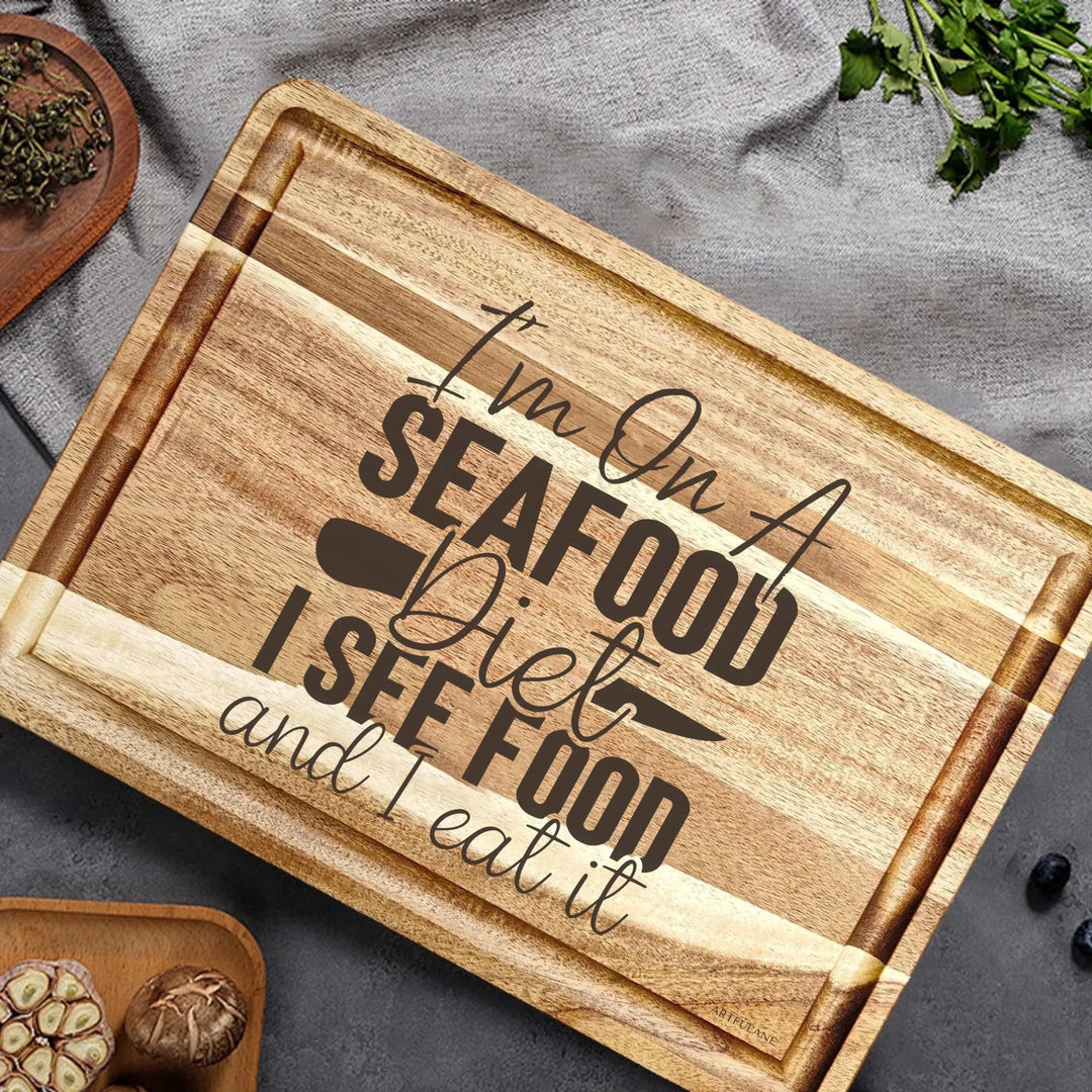 Engraved wooden cutting boards in brown, featuring custom kitchen quote designs by ARTFULANE