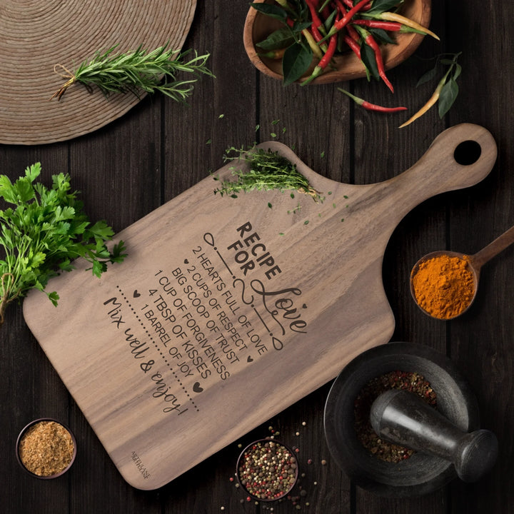 Engraved recipe cutting boards in natural walnut brown, featuring 20 kitchen recipe designs by ARTFULANE