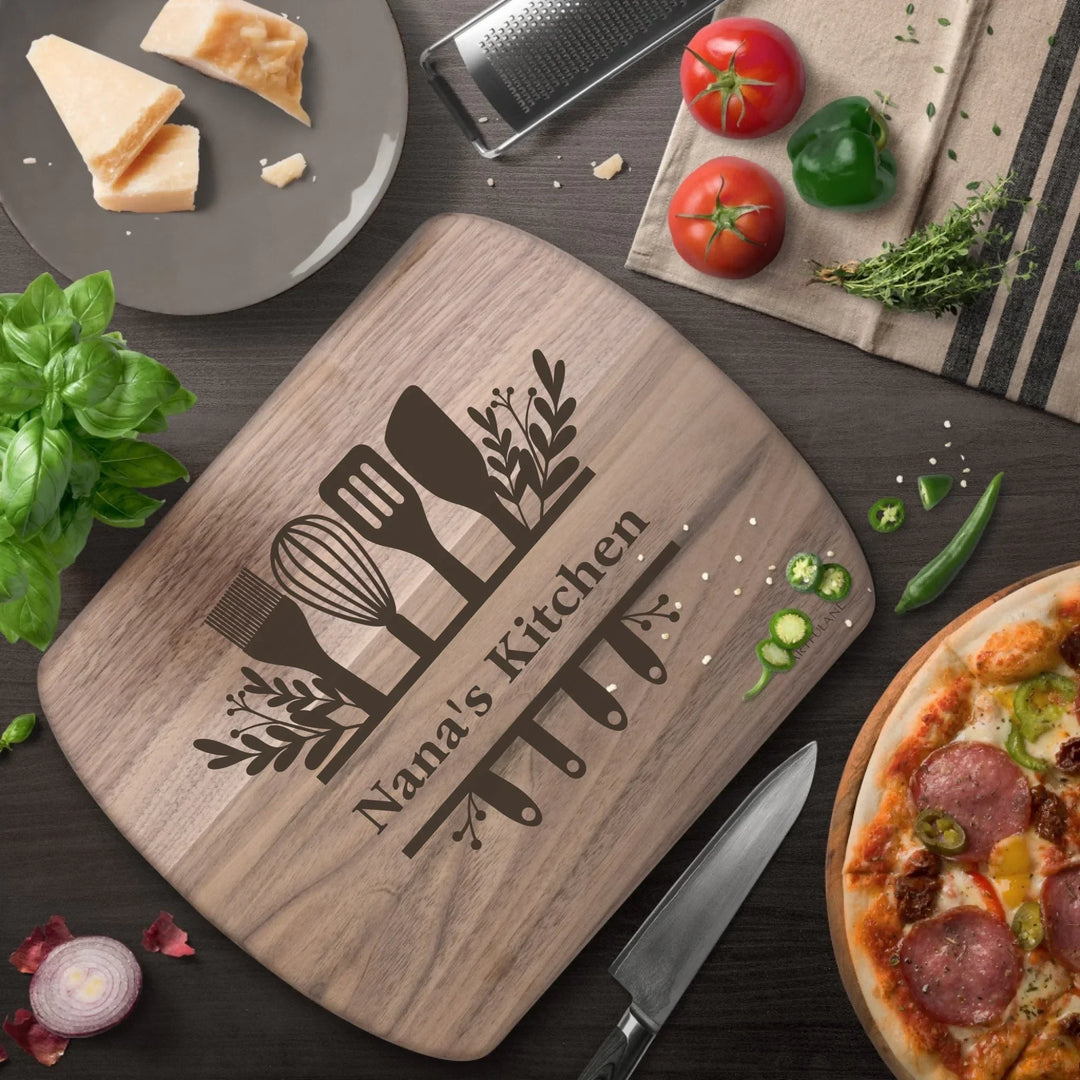 Custom kitchen monogram engraved cutting boards in walnut and maple hardwood, personalized with family names and utensil designs by ARTFULANE