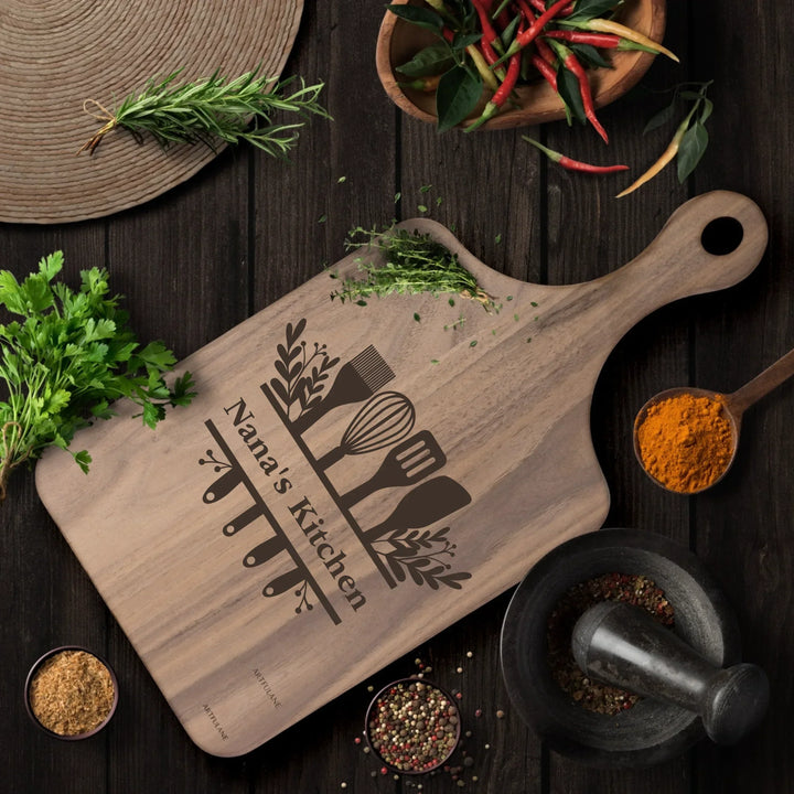 Custom kitchen monogram engraved cutting boards in walnut and maple hardwood, personalized with family names and utensil designs by ARTFULANE