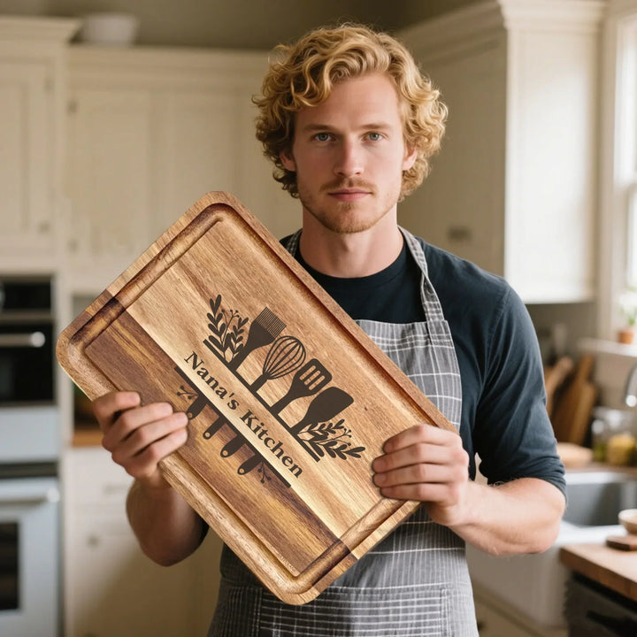 Man holding Custom kitchen monogram engraved cutting boards in walnut and maple hardwood, personalized with family names and utensil designs by ARTFULANE