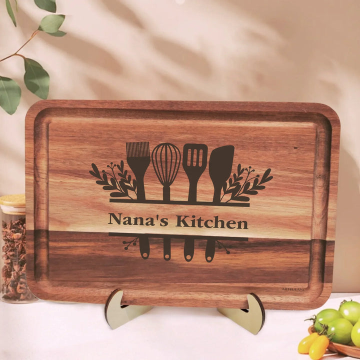 Custom kitchen monogram engraved cutting boards in walnut and maple hardwood, personalized with family names and utensil designs by ARTFULANE