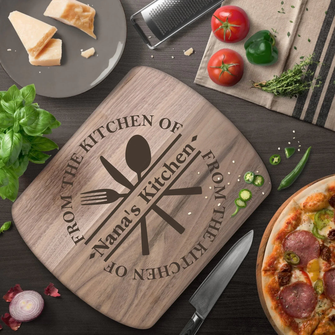 Custom kitchen monogram engraved cutting boards featuring utensils, scrolls, and name designs in walnut and maple wood by ARTFULANE