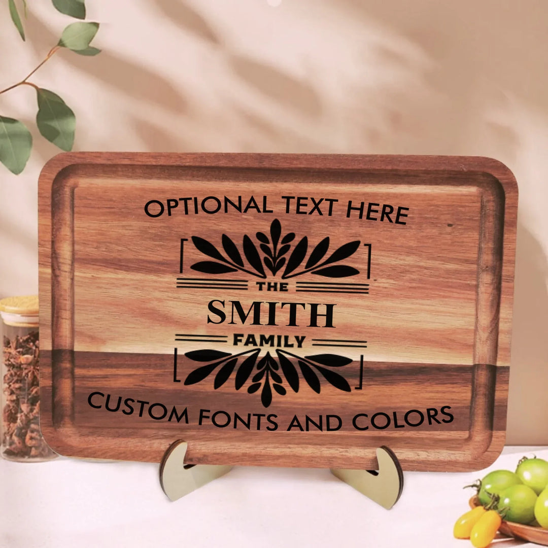 Personalized kitchen cutting board engraved with family monogram and optional top or bottom text, crafted from walnut and maple hardwood by ARTFULANE