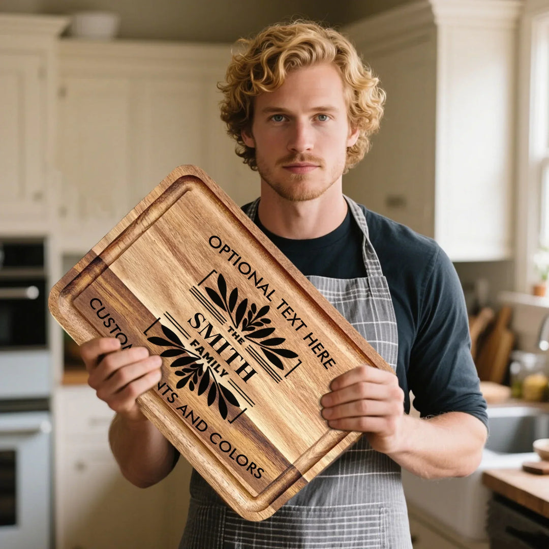 Man holding Personalized kitchen cutting board engraved with family monogram and optional top or bottom text, crafted from walnut and maple hardwood by ARTFULANE