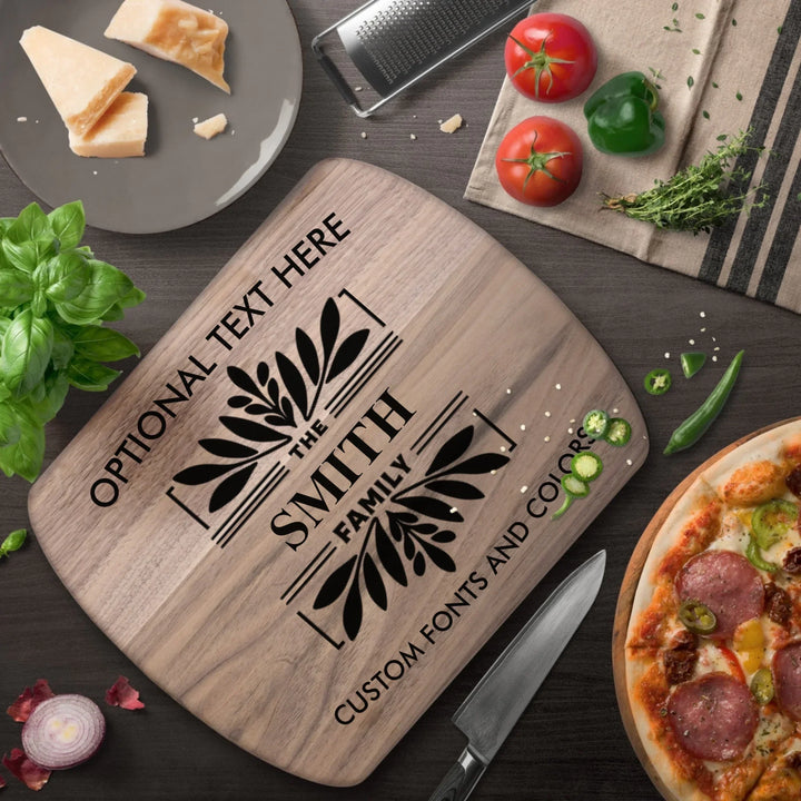 Personalized kitchen cutting board engraved with family monogram and optional top or bottom text, crafted from walnut and maple hardwood by ARTFULANE