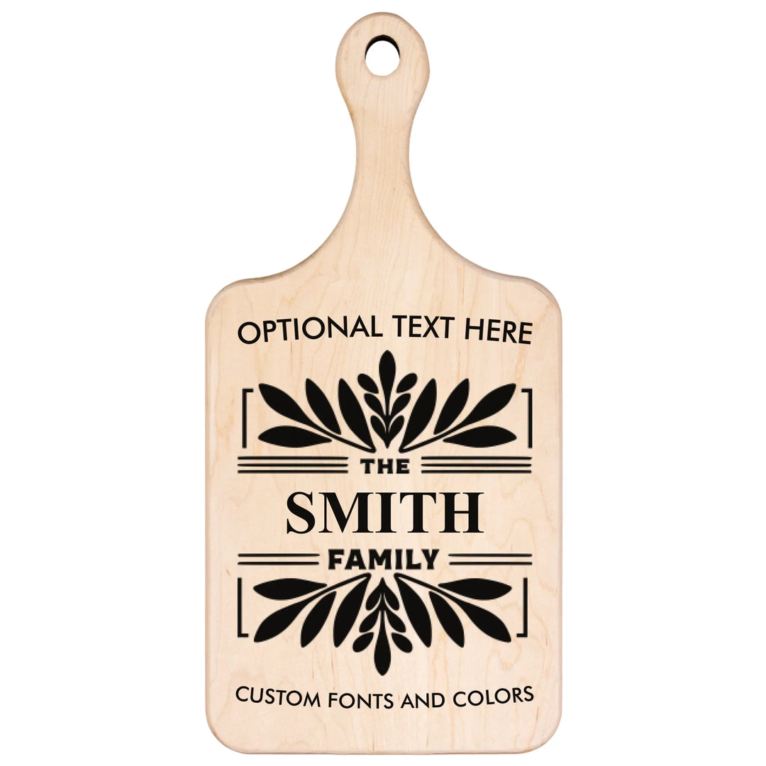 Personalized kitchen cutting board engraved with family monogram and optional top or bottom text, crafted from walnut and maple hardwood by ARTFULANE