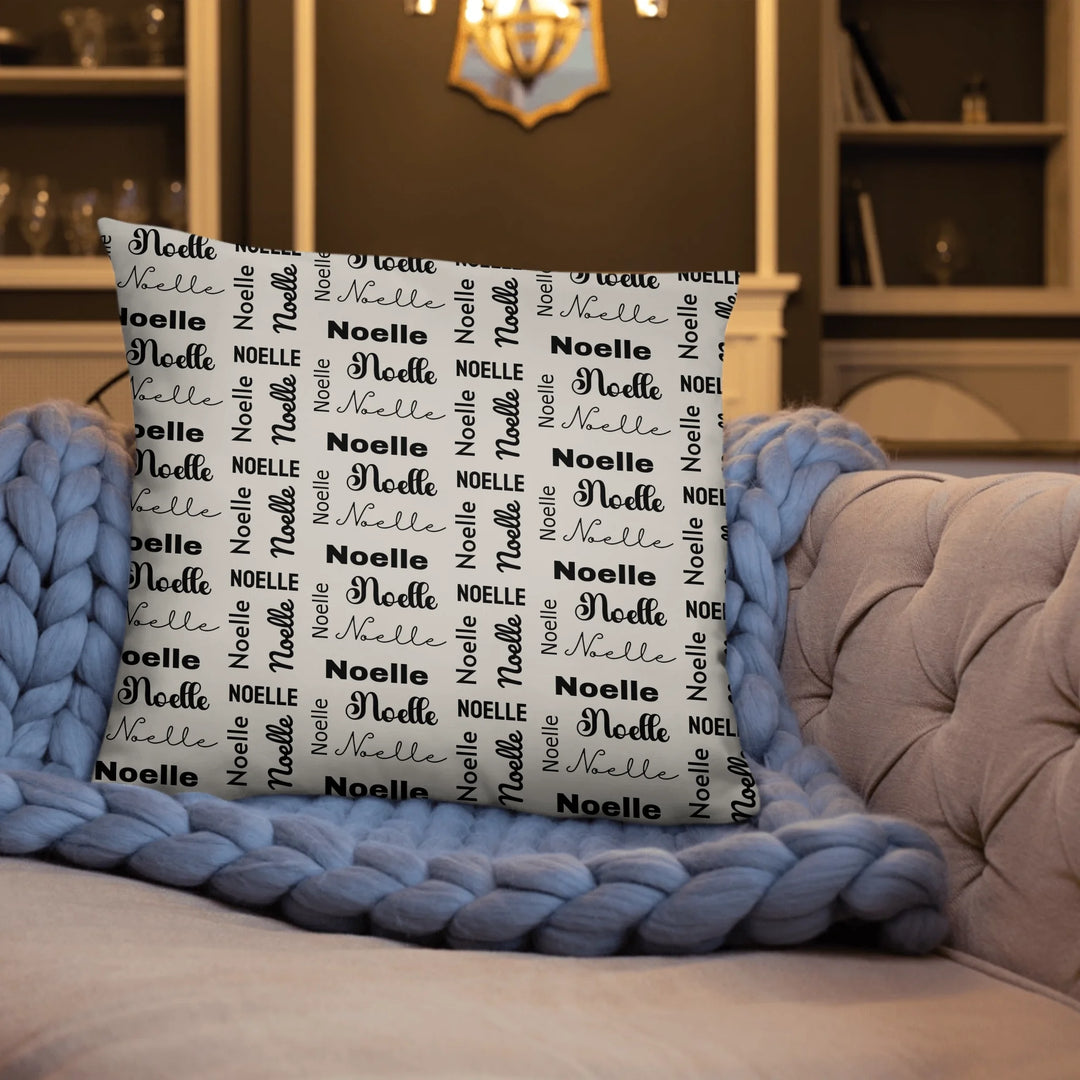 Custom repeating name pillow in black text on beige background — personalized home décor accent with adjustable text color and style-ARTFULANE