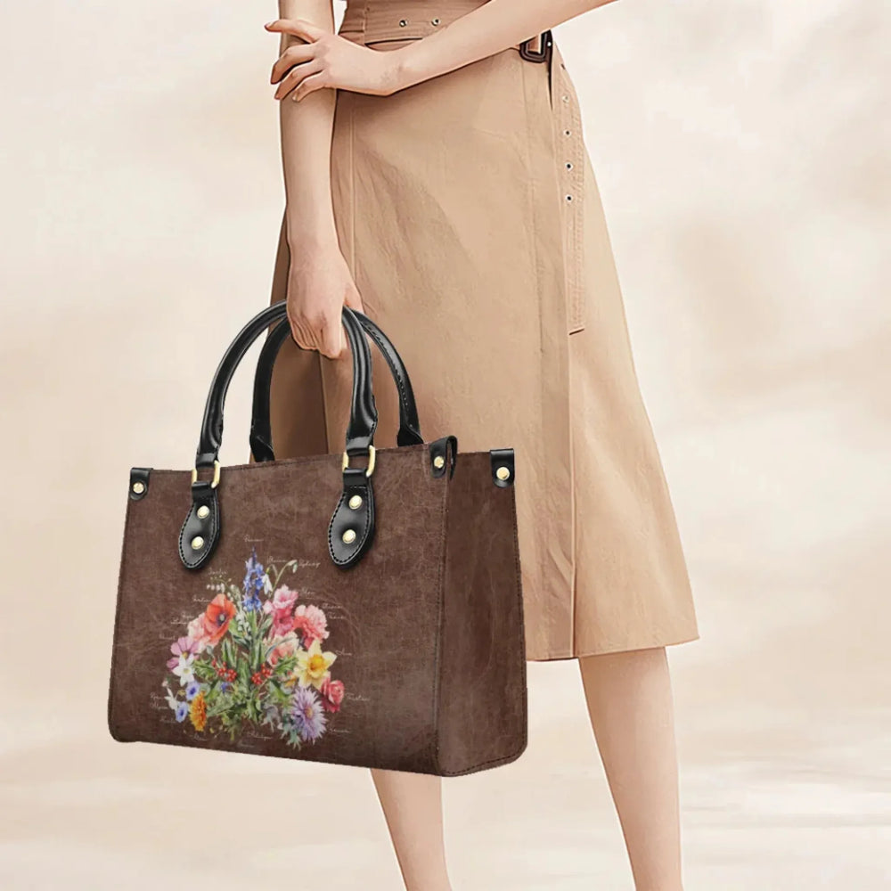 Custom-Birth-Month-Flower-Bouquet-Twill-Faux-Leather-Handbag-on-model-artfulane