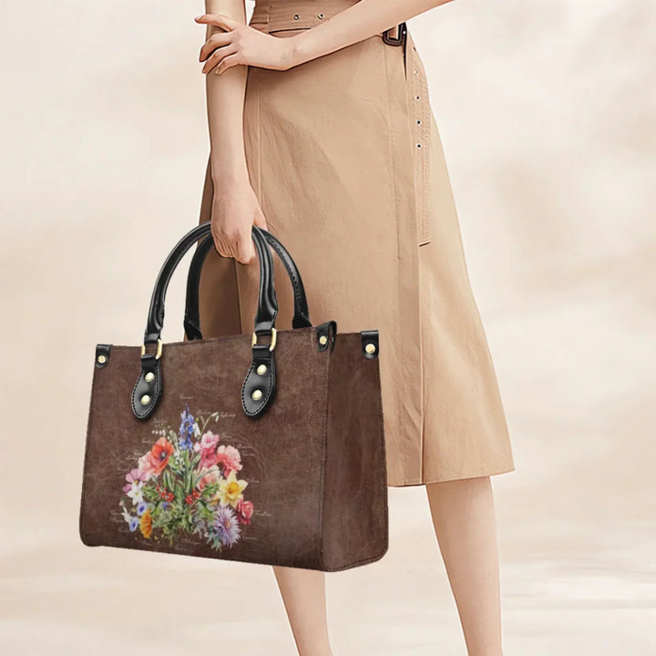 Custom-Birth-Month-Flower-Bouquet-Twill-Faux-Leather-Handbag-on-model-artfulane