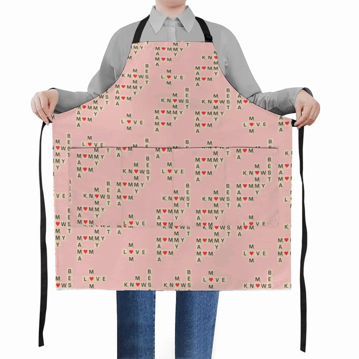 Apron-with-Pocket-Mom-Knows-Best-Word-Tile-in-peach-artfulane