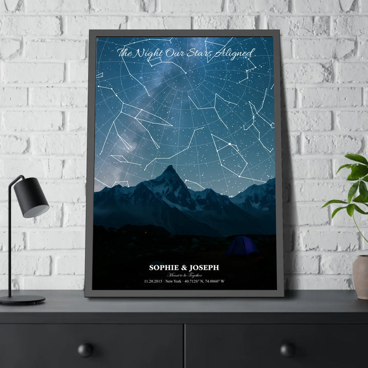 Personalized star map wall art with customizable background, title, names, date, location, and coordinates - 28x40 framed poster on table-ARTFULANE