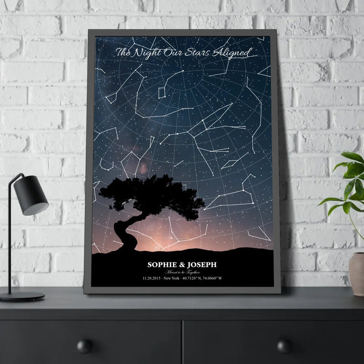 Personalized star map wall art with customizable background, title, names, date, location, and coordinates - 28x40 framed poster on table-ARTFULANE