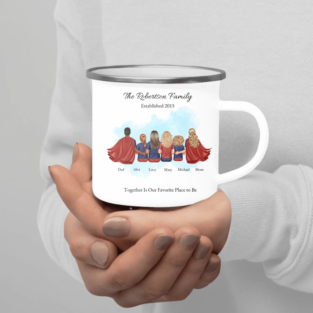 Personalized superhero family mug with matching outfits and names, seated back view - enamel camping mug in hand-ARTFULANE