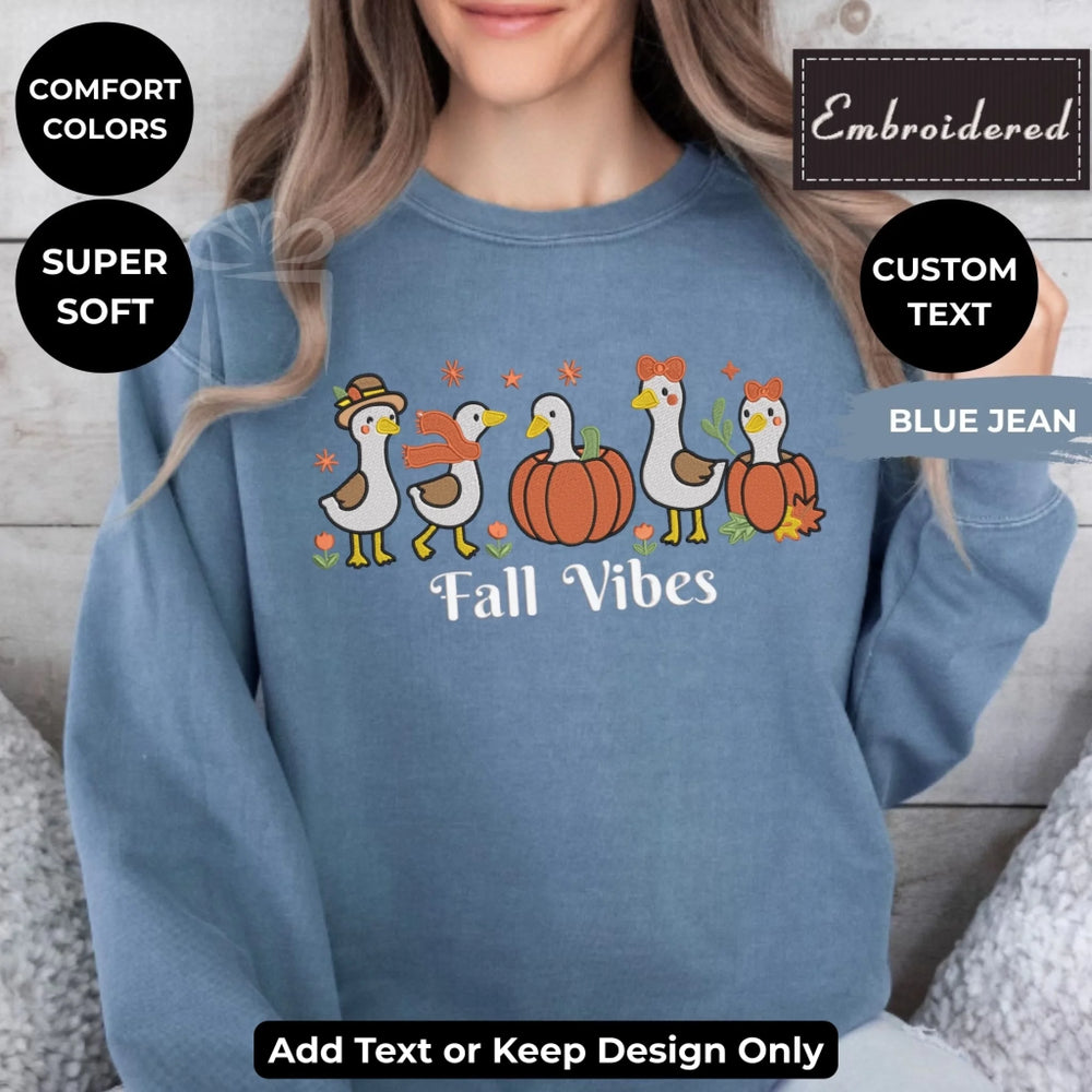 Fall Geese Sweatshirt in blue jean – Comfort Colors embroidered crewneck with geese and pumpkin design, customizable text option-ARTFULANE