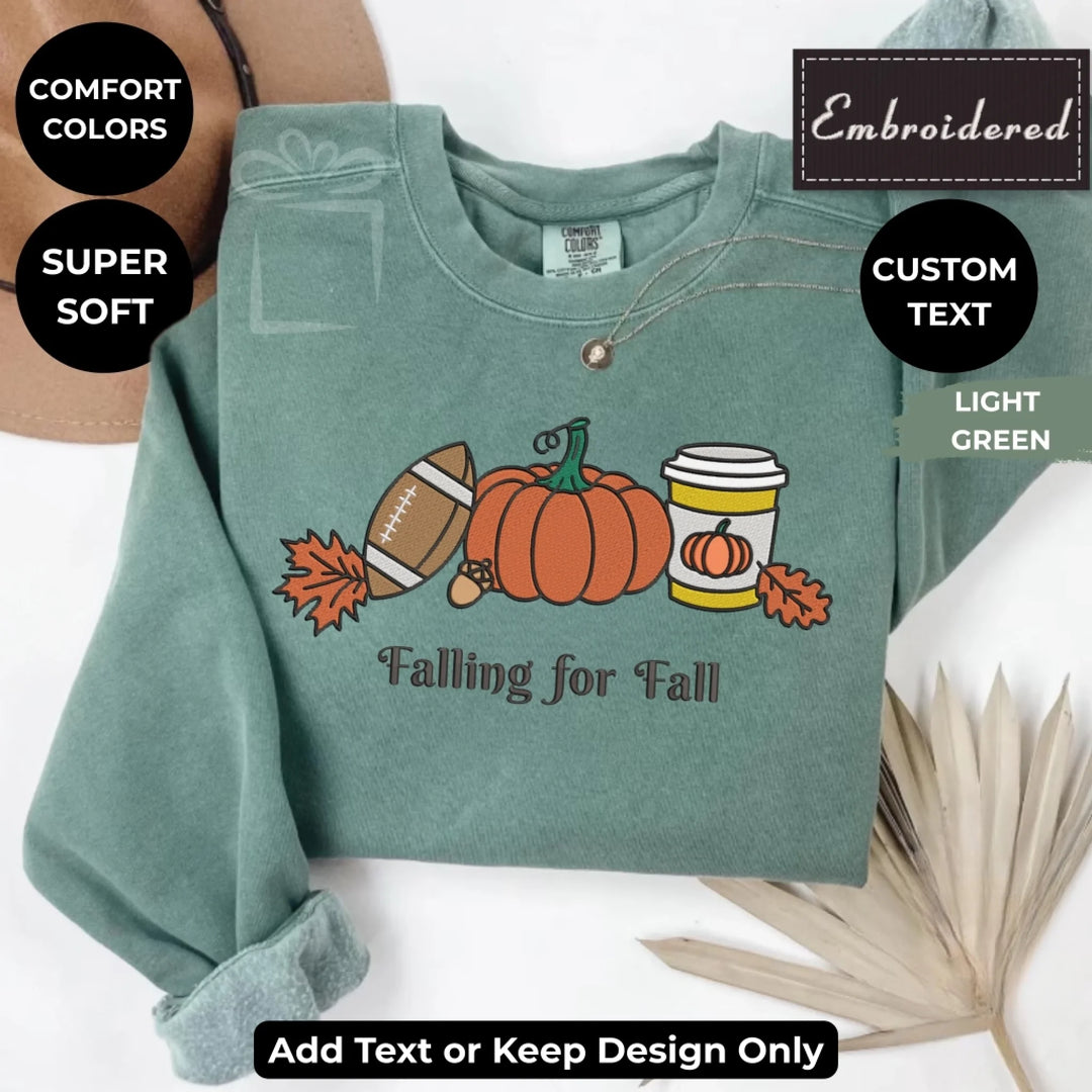 Fall Football Sweatshirt in light green – Comfort Colors embroidered crewneck with pumpkin, football, and coffee design, customizable text option-ARTFULANE