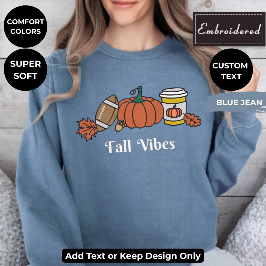 Fall Football Sweatshirt in blue jean – Comfort Colors embroidered crewneck with pumpkin, football, and coffee design, customizable text option-ARTFULANE