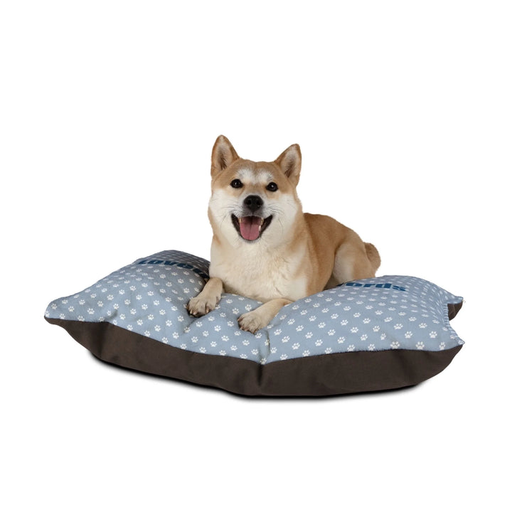Dog sitting on Personalized paws print pet bed with custom text like a name. Available in different paw print colors for dogs or cats-ARTFULANE