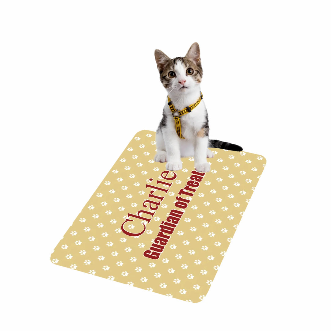 Cat using Personalized paws print pet feeding mat with custom text like a name. Available in different paw print colors for dogs or cats-ARTFULANE