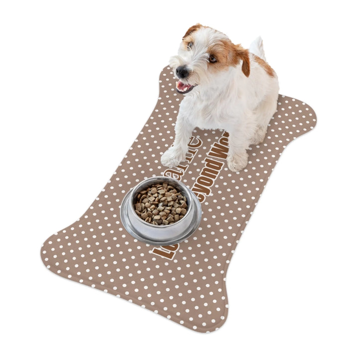 Dog using Personalized polka dots pet bone-shaped feeding mat with custom text like a name. Available in different polka dot pattern colors for dogs or cats-ARTFULANE