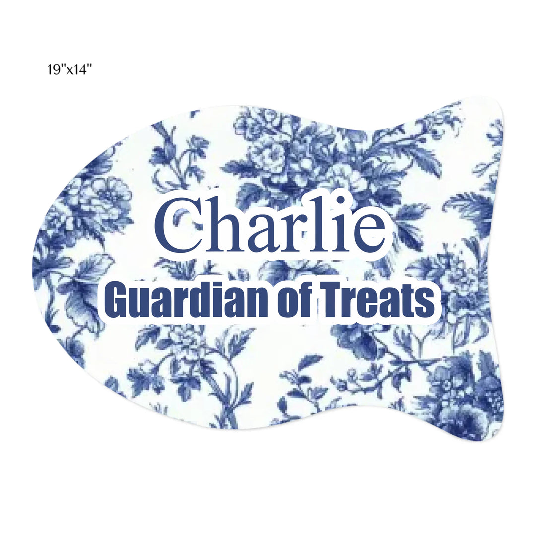 Cat using Personalized French Country Blue Toile de Jouy pet fish-shaped feeding mat with custom text like a name. Available in different Toile de Jouy patterns for dogs or cats-ARTFULANE