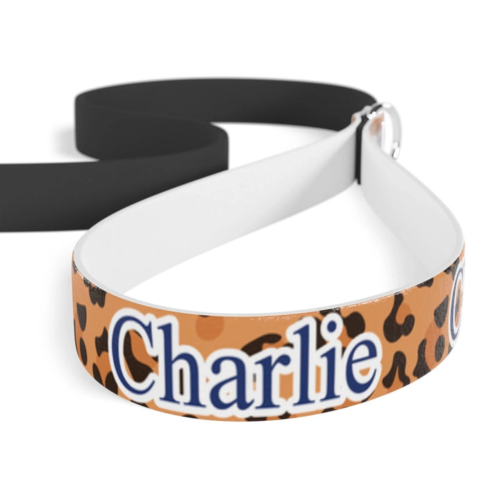 Closeup of Personalized Animal Print pet collar with custom text like a name. Available in different animal print colors (leopard, cow, snake, crocodile, cheetah, dalmatian, giraffe, zebra, tiger, scales) for dogs or cats-ARTFULANE