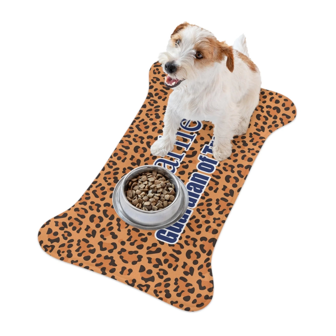 Dog using Personalized Animal Print pet bone-shaped feeding mat with custom text like a name. Available in different animal print colors (leopard, cow, snake, crocodile, cheetah, dalmatian, giraffe, zebra, tiger, scales) for dogs or cats-ARTFULANE