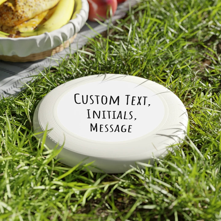 Personalized text frisbee featuring initials, name, message, or quote in any color and various fonts — premium gift for sport lovers by ARTFULANE