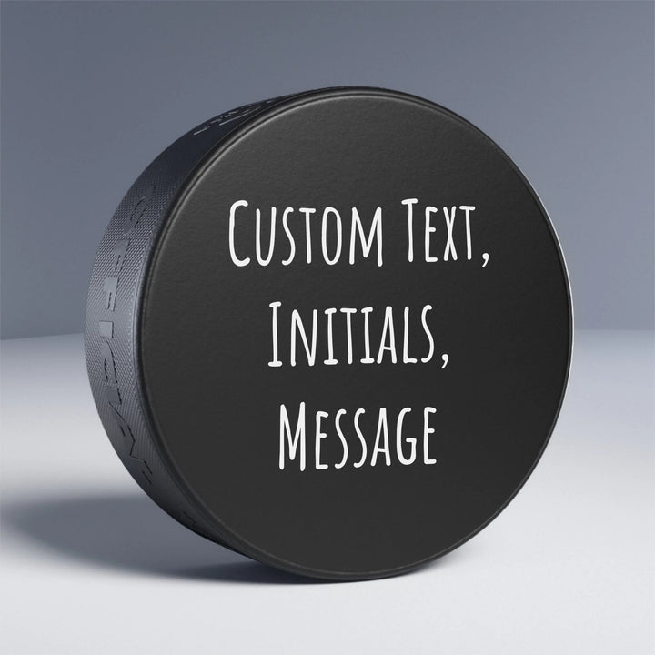 Personalized text hockey puck featuring initials, name, message, or quote in any color and various fonts — premium gift for sport lovers by ARTFULANE