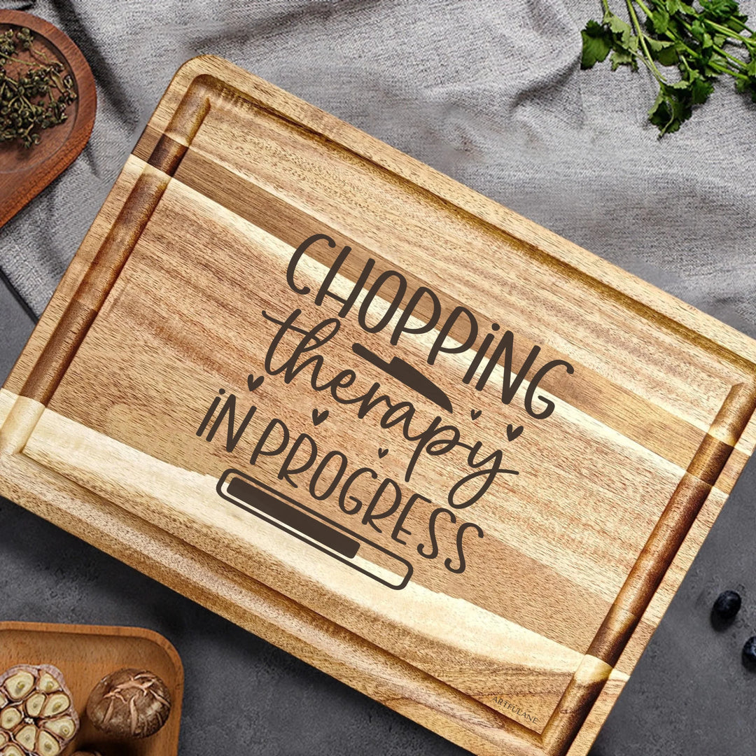 Engraved wooden cutting boards in brown, featuring custom kitchen quote Chef Humor designs by ARTFULANE