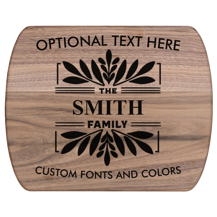 Personalized kitchen cutting board engraved with family monogram and optional top or bottom text, crafted from walnut and maple hardwood by ARTFULANE