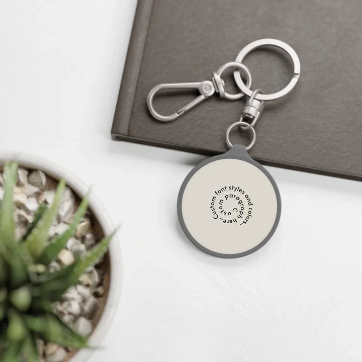 travel keyring tag on table-Custom spiral text, fonts, and colors-ARTFULANE