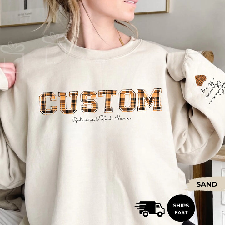 Personalized ‘This Mama Loves Her Blessings’ Gildan sweatshirt or hoodie, featuring custom kids names printed below gift box icons on the sleeve — cozy unisex holiday apparel for moms or grandmas-ARTFULANE