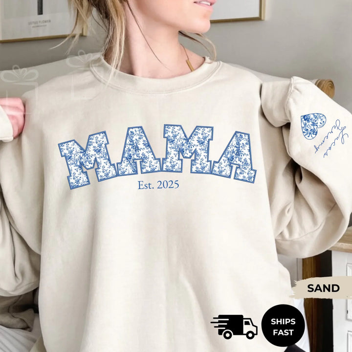 Personalized ‘This Mama Loves Her Blessings’ Gildan sweatshirt or hoodie, featuring custom kids names printed below gift box icons on the sleeve — cozy unisex holiday apparel for moms or grandmas-ARTFULANE