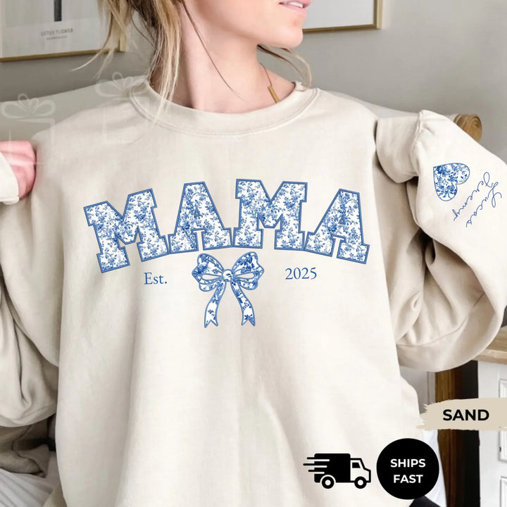 Personalized ‘This Mama Loves Her Blessings’ Gildan sweatshirt or hoodie, featuring custom kids names printed below gift box icons on the sleeve — cozy unisex holiday apparel for moms or grandmas-ARTFULANE