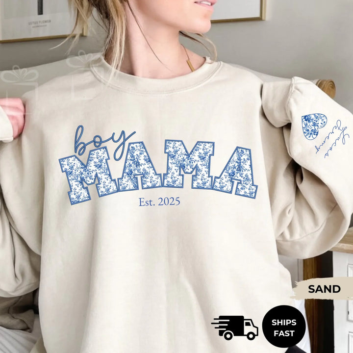 Personalized ‘This Mama Loves Her Blessings’ Gildan sweatshirt or hoodie, featuring custom kids names printed below gift box icons on the sleeve — cozy unisex holiday apparel for moms or grandmas-ARTFULANE