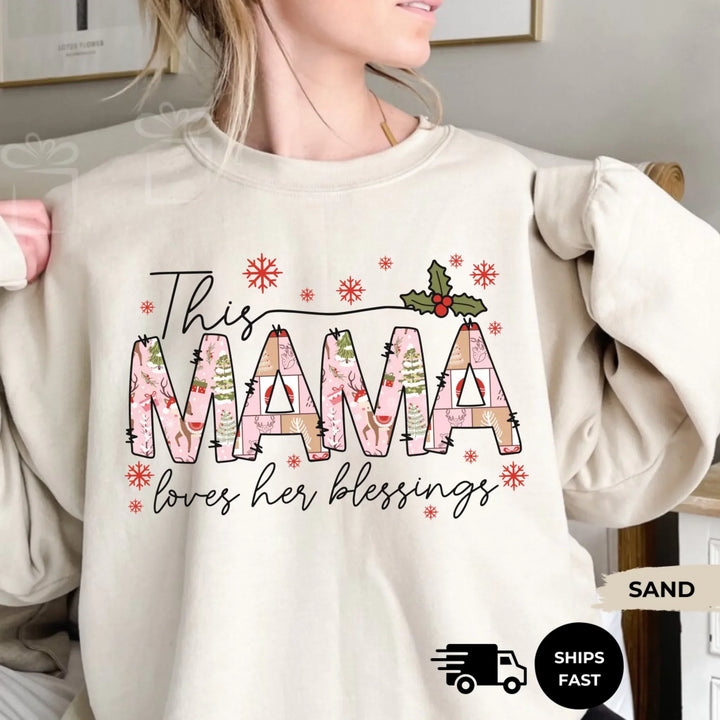 Personalized ‘This Mama Loves Her Blessings’ Gildan sweatshirt or hoodie, featuring custom kids names printed below gift box icons on the sleeve — cozy unisex holiday apparel for moms or grandmas-ARTFULANE