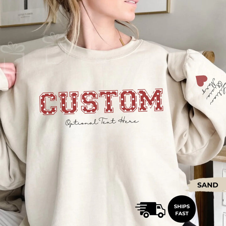 Personalized ‘This Mama Loves Her Blessings’ Gildan sweatshirt or hoodie, featuring custom kids names printed below gift box icons on the sleeve — cozy unisex holiday apparel for moms or grandmas-ARTFULANE