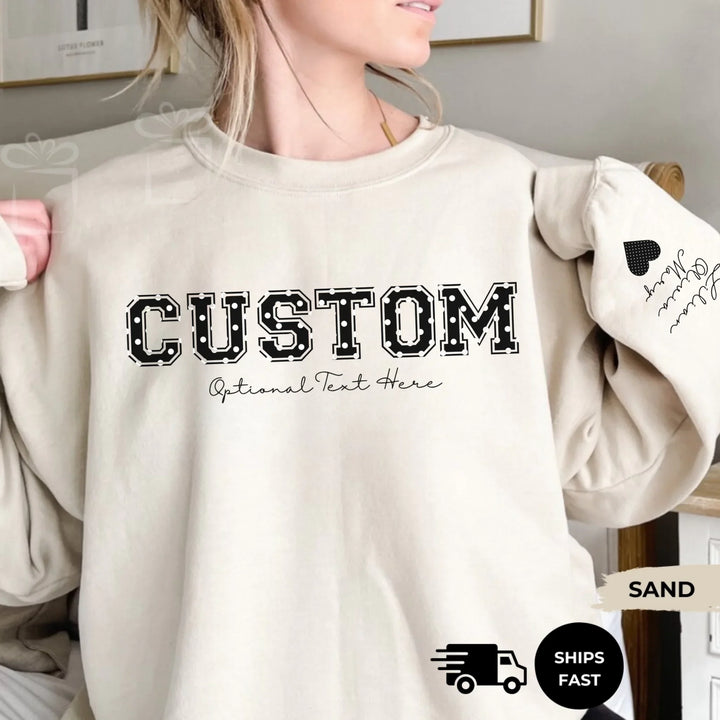 Personalized ‘This Mama Loves Her Blessings’ Gildan sweatshirt or hoodie, featuring custom kids names printed below gift box icons on the sleeve — cozy unisex holiday apparel for moms or grandmas-ARTFULANE