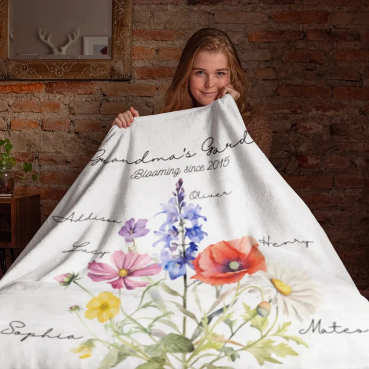 woman-covered-with-Custom-Watercolor-Birth-Month-Flower-bouquet-Blanket-artfulane